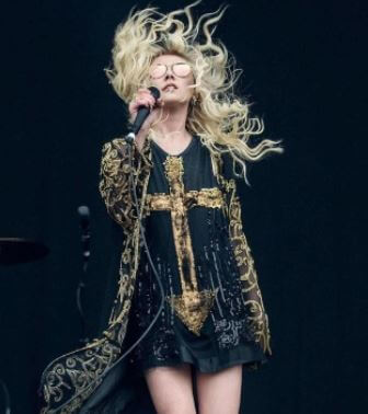 Taylor Momsen performing on the stage.